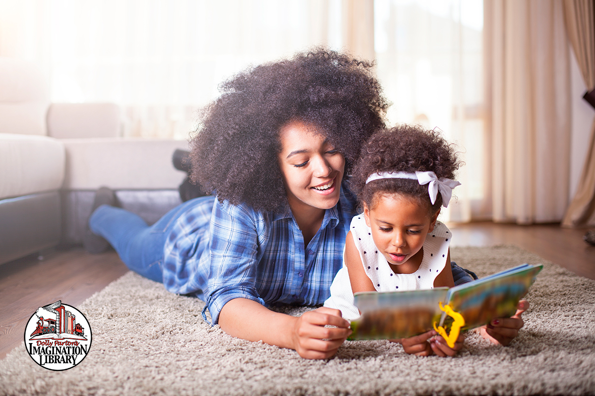 mother daughter reading a book